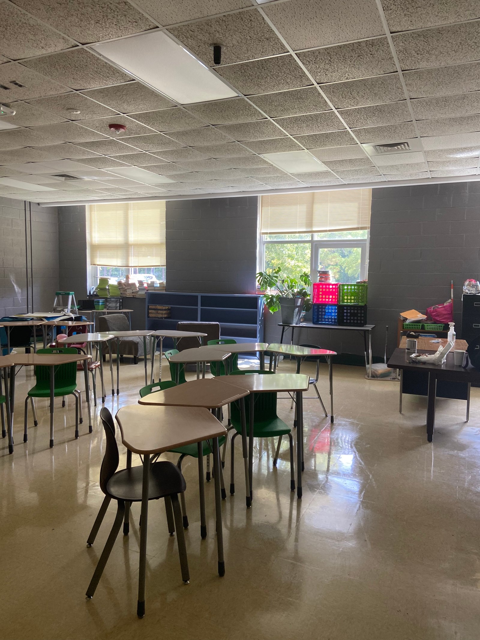 An organized classroom with collaborative desk arrangements